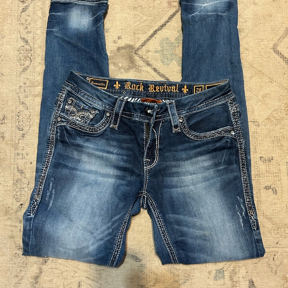 Rock Revival Blue Denim with Striped Interior size 28 waist